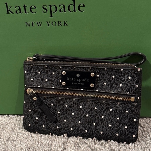 kate spade Handbags - Kate Spade Black and White Polka Dot Wristlet with Storybook Lining